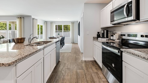 Our homes feature open floorplans that combine style and functionality. You'll find sleek granite countertops, islands, and shaker-style cabinets in the kitchen. For that modern touch, you'll also get stainless-steel appliances, dishwasher, and microwave. Smart home technology is included, providing convenience and efficiency at your fingertips. Jacksonville, North Carolina is a thriving Military town with plenty of southern charm. Home to Marine Corps Base Camp Lejeune and a vibrant coastal community. This bustling city offers a perfect blend of military heritage, outdoor recreation, and family-friendly attractions. With public access to Onslow Beach and North Topsail Beach, you are sure to get your fix of sun! If the ocean isn’t your thing, come and shop at Jacksonville Mall, or explore the natural beauty of Hammocks Beach State Park nearby. With a growing population and strong economic outlook, Jacksonville is an ideal destination for military families, young professionals, and retirees alike.