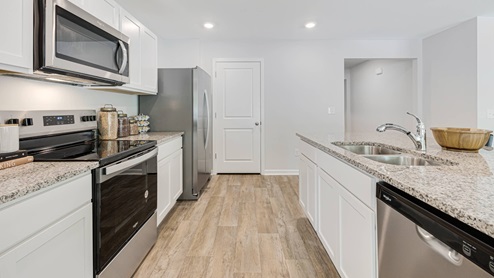 Our homes feature open floorplans that combine style and functionality. You'll find sleek granite countertops, islands, and shaker-style cabinets in the kitchen. For that modern touch, you'll also get stainless-steel appliances, dishwasher, and microwave. Smart home technology is included, providing convenience and efficiency at your fingertips. Jacksonville, North Carolina is a thriving Military town with plenty of southern charm. Home to Marine Corps Base Camp Lejeune and a vibrant coastal community. This bustling city offers a perfect blend of military heritage, outdoor recreation, and family-friendly attractions. With public access to Onslow Beach and North Topsail Beach, you are sure to get your fix of sun! If the ocean isn’t your thing, come and shop at Jacksonville Mall, or explore the natural beauty of Hammocks Beach State Park nearby. With a growing population and strong economic outlook, Jacksonville is an ideal destination for military families, young professionals, and retirees alike.