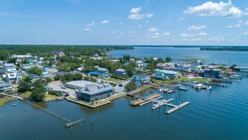 Your new residence is only a few minutes away from peaceful beaches, convenient amenities, and charming dining venues. Nearby, you'll find Morehead City, host to the renowned Big Rock Blue Marlin Tournament, one of the largest and most prestigious events on the Eastern Seaboard. Additionally, you are in proximity to historic Beaufort, Shakleford Banks, Emerald Isle, and Atlantic Beach.
