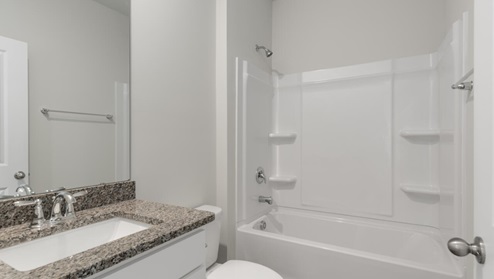 The Primary Suite offers a massive closet and a luxurious bathroom with a walk-in shower, linen closet, and dual vanity. In addition, there are another 2 bedrooms and full bath. In every bedroom you’ll have vinyl flooring and a closet in each room. Whether these rooms become bedrooms, office spaces, or other bonus rooms, there is sure to be comfort.