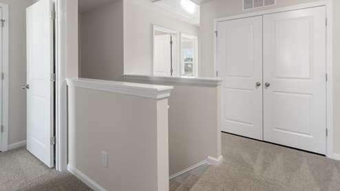 Your new Mitchell features an open concept first floor anchored by a spacious kitchen with a peninsula bar that overlooks your family and dining room. Your bedrooms are on the second floor with a large primary suite and bath with double vanities and walk in shower.