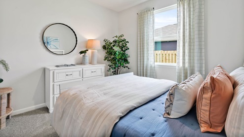 The primary bedroom has its own attached bathroom that features a walk-in closet and all the space you need to get ready in the morning. Sharing a sink isn’t a worry with the double vanity, and you also get additional privacy with a separate door for the toilet and shower.