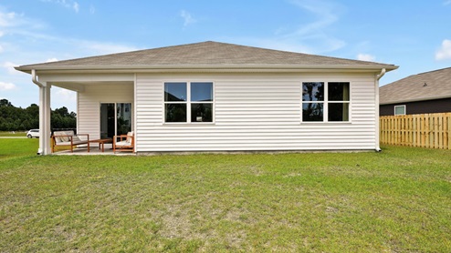 Enjoy the covered porch perfect for entertaining and enjoying the Carolina evenings.