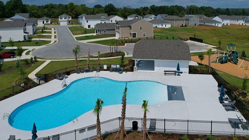 Grand Oaks pool, cabana, and playground amenity