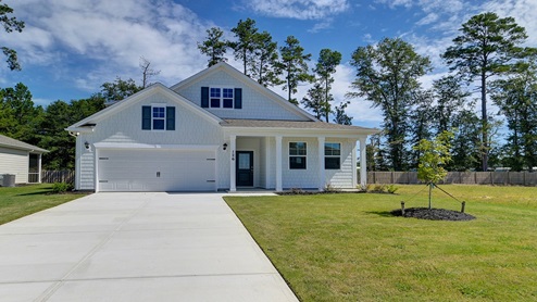 The Dover exterior with spacious yard
