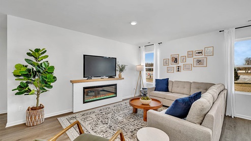 Great room with decorated fireplace