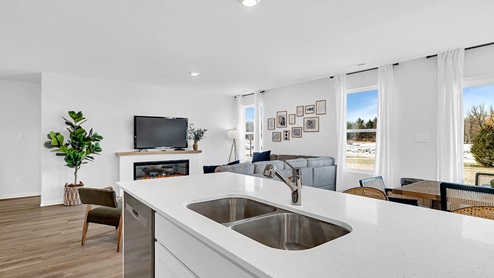Large kitchen island with sink and dishwasher