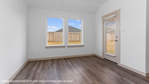 Breakfast nook with vinyl flooring.