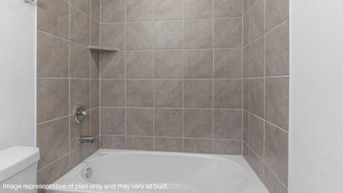 Secondary bathroom with tub/shower combo.