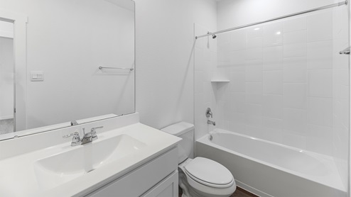 bath 2 with single vanty and tub/shower combo