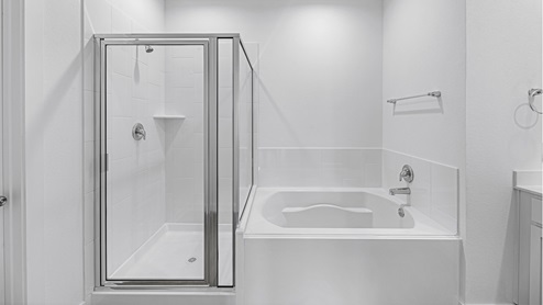 primary bath with tub and shower combo