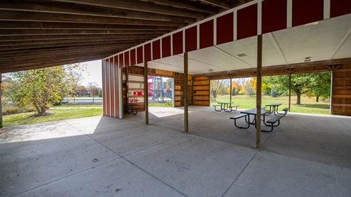 Shelter with picnic tables
