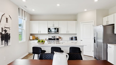kitchen with white cabinets