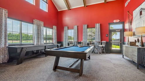 miles farm game room with billiard table