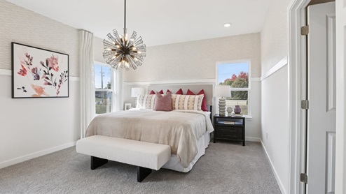 primary bedroom with large windows