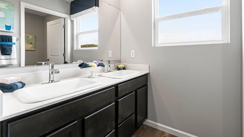 Parlor Bluffs Henley model Bathroom 1 on second floor with vanity sink and tub shower