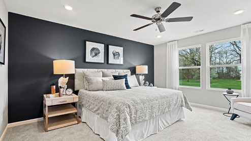 Parlor Bluffs Henley Model Main Bedroom with large windows and 52" ceiling fan