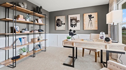 Parlor Bluffs Henley Model Office with windows and carpet flooring