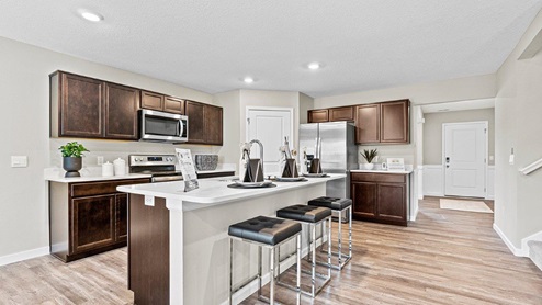 Parlor Bluffs Henley Model Kitchen with island with room for seating