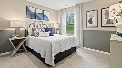 Parlor Bluffs Henley Model Bedroom 5 with carpet flooring and single window.