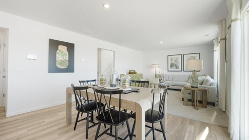 Grasslands at Broad Acres Bellamy Model open floor plan dining room and kitchen