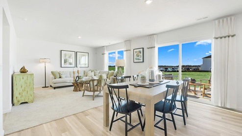 Grasslands at Broad Acres Bellamy Model open floor plan dining room and kitchen