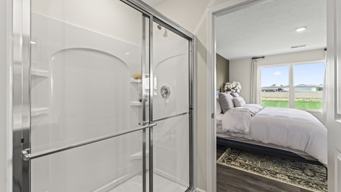 Bathroom with a walk in shower.