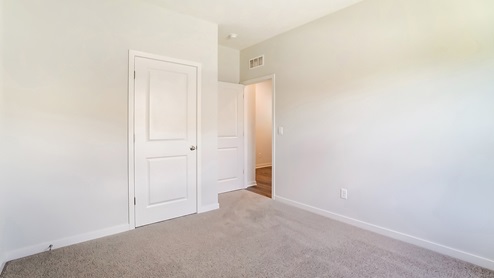 third bedroom closet and entry