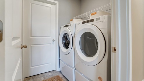 laundry room with washer and dryer