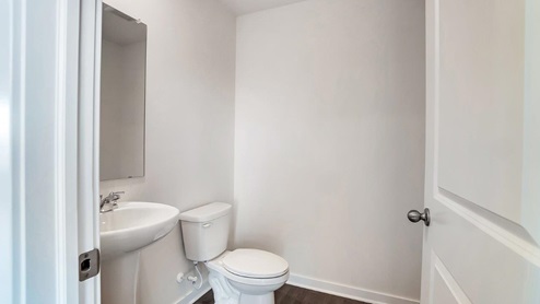 powder room vanity and toilet