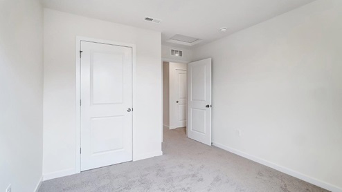 third bedroom closet and entry