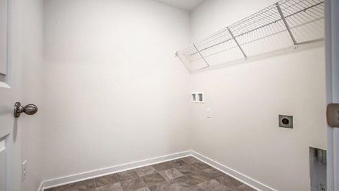 laundry room with wire shelving