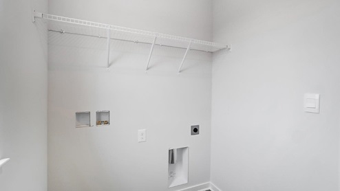 laundry room with wire shelving