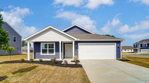 Single story home with blue siding, covered front porch, two car garage