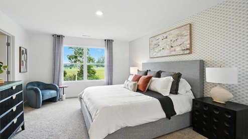 furnished primary bedroom