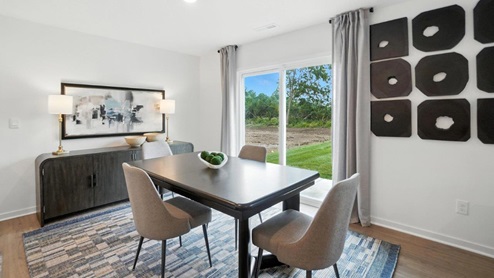 dining table and chairs, rear sliding door