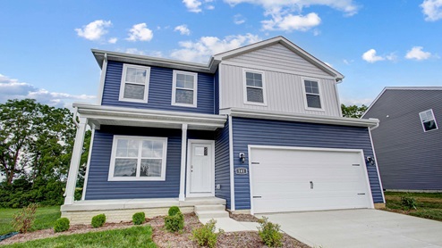 Exterior blue two story home with white cladding