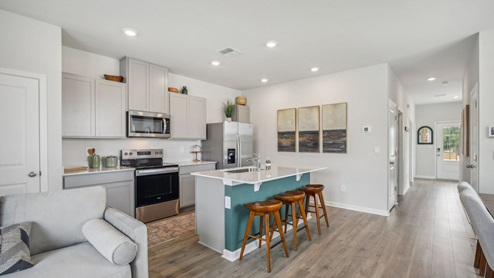 Inside new two story townhome in river landing with all new appliances, decorated with elevated modern furniture and Nashville chic design