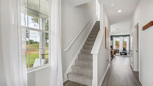 Inside new two story townhome in river landing with all new appliances, decorated with elevated modern furniture and Nashville chic design