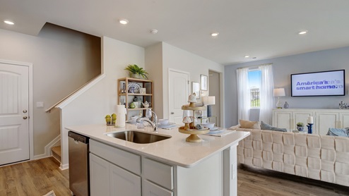 Kitchen and living room in two story townhome