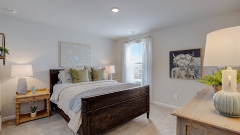 Second bedroom upstairs in two story townhome