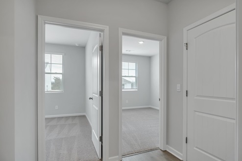 Bedrooms that share a wall with easy access to each other.