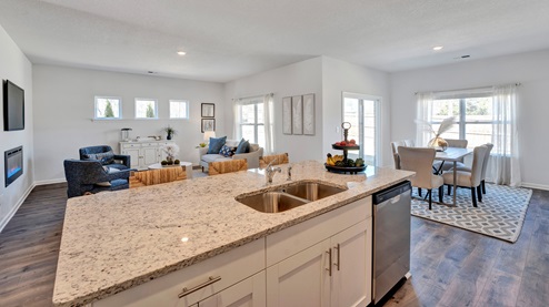 Spacious kitchen island with granite countertops