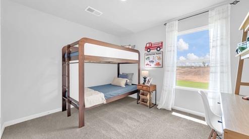 Fourth bedroom with bunk beds comfortably suited for a large family