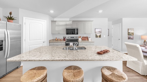 Kitchen area with stunning granite countertops