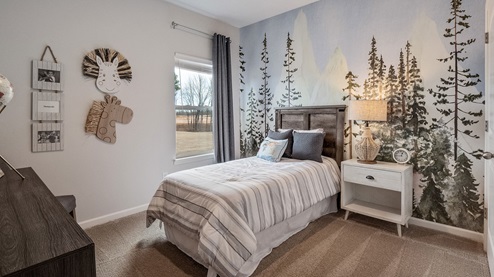 Third bedroom with carpet flooring and neutral walls