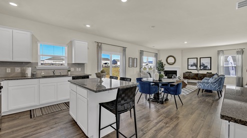 Kitchen with island and bar seating