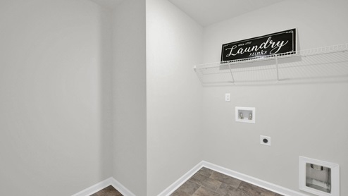 Laundry room with shelving