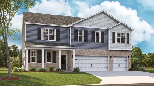 Two story home with brick and two car garage