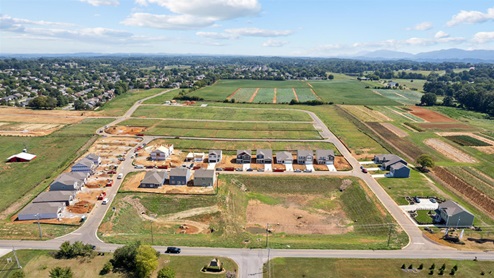 Aerial shot of Best Farms from above, showing a mix of developed lots and completed homes.
